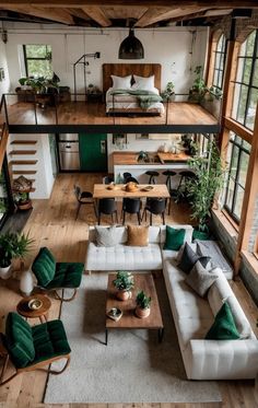 an overhead view of a living room with couches and tables