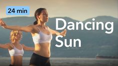 two women in white tops and black shorts are doing yoga with the words dancing sun above them