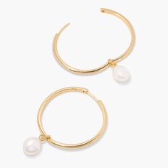 Step out in style with the Astrid Pearl Hoops. These gold hoops boast a playful touch of pearl and are guaranteed to have heads turning. Perfect for any occasion, jazz up your look with a pair of hoops. Available in 14k gold plated brass 1 1/2" hoop 10mm Freshwater Baroque pearl Hinge closure Protected with an anti-tarnish barrier SKU: BYE1140 Modern Gold Hoop Earrings With Pearl Charm, Metal Hoop Earrings With Pearl Drop, Hoop Earrings With Pearl Charm, Hoop Pearl Earrings, Modern Jewellery Design, Gold Hoops, Baroque Pearls, Modern Jewelry, Signature Style