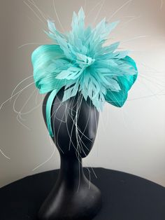 Tufts of aqua and teal abaca silk topped with a beautiful pale aqua feather crown. Sits on a comfortable aqua headband. Ships in a high quality storage box. One of a kind.  Perfect for Kentucky Derby, Royal Ascot, church, weddings, just for fun. Feather Crown, Church Weddings, Pale Aqua, Feather Fascinators, Royal Ascot, Fascinator Hats, Louisville Ky, Kentucky Derby, Silk Top