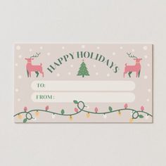 a pink christmas gift card with reindeers and lights on the front, says happy holidays to you from me