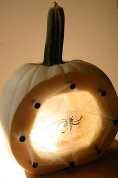 a carved pumpkin sitting on top of a table