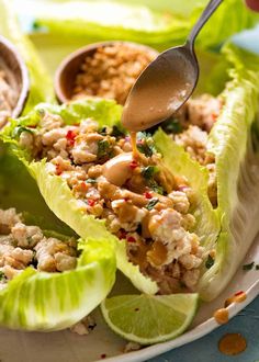 lettuce wraps filled with chicken and garnishes