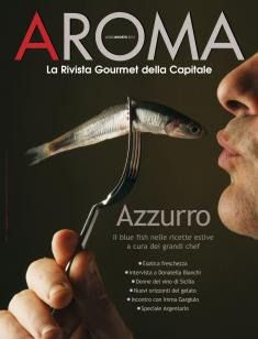 a man is holding a fork and looking at a fish on the cover of a magazine