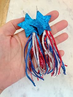 Beautiful 4th of July earrings with stars and sequins! Perfect for 4th of July Jewelry, Patriotic jewelry, red, white and blue jewelry! These are very long - measures approx 5-6". Blue Patriotic Earrings For Independence Day, Patriotic Blue Earrings For Independence Day, Patriotic Red Star-shaped Earrings, Patriotic Red Star Earrings, Patriotic Blue Star Jewelry, Patriotic Blue Star Shaped Jewelry, Patriotic Blue Star-shaped Jewelry, Blue Star Charm Earrings For Party, Red Star-shaped Jewelry For Parties