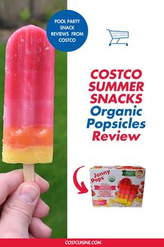 a hand holding an ice lolly popsicle with the text costco summer snacks organic popsicles review