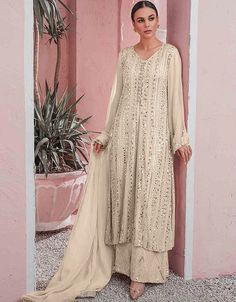 Beige Sharara style Suit Faux Georgette Salwar Kameez in Embroidery, Sequins & Lace Work:Arabic Attire #bestsalwarsuitsonline #stitchingdesignsalwarkameez #indianonlineshop #indianstylesuit #churidardesign #ladiesredsuitsforsale #kameezdesigns #indianfancysuits #designersalwarsonline #beautifulsuitsforladies #indianladiessuits #wwwsuitcom #designerdresssuitsladies #buyindiansuits #howtostitchsalwarkameez #onlinesalwarsuitsindia Green Sharara, Georgette Palazzo, Palazzo Style, Latest Salwar Kameez, Kameez Designs, Pakistani Salwar, Pakistani Suit, Punjabi Outfits, Georgette Dupatta