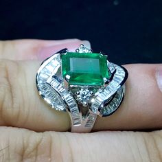 MADE TO ORDER ITEM. Takes 7 business days to complete. ENJOY OUR WORRY-FREE SERVICE AND THE DAZZLING, GENUINE JEWELRY WE DESIGN AND HANDCRAFT WITH LOVE❤️ ABOUT THE ITEM: EXTREMELY VIVID, Certified, JUMBO 4.73 total carats weight, Emerald ring. The ring was handmade and designed uniquely! Very elegant! Would be the perfect gift for your loved one, or as an engagement ring! Free ring sizing. Free return! CUSTOM-MADE RING, PERFECTLY HANDCRAFTED TO FIT THE ENCHANTING, VIVID EMERALD SUGGESTED RETAIL Formal Moissanite Emerald Ring, Exquisite White Gold Baguette Cut Emerald Ring, Art Deco White Gold Emerald Ring For Formal Occasions, Elegant Hallmarked Baguette Cut Emerald Ring, Vintage Emerald Rings, Famous Jewelry, Handmade Gold Ring, Emerald Ring Vintage, Diamond Pendants Designs