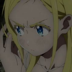 an anime character with blonde hair and blue eyes looking at the camera while holding her hand up to her face