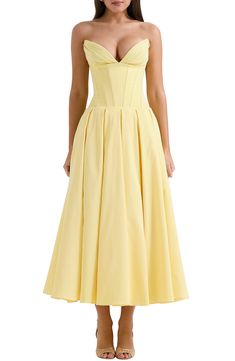 A buttery yellow gown is designed with the brand's signature boned bodice, a swishy, tulle-lined skirt and the perfection of a pair of discreet pockets. Exclusive retailer Hidden back-zip closure Strapless Plunge neck Side-seam pockets Lined 65% viscose, 35% polyester Dry clean Imported Camila Cohelo Dresses, Champagne Bars, Yellow Strapless Dress, Voluminous Skirt, Strapless Summer Dress, Backless Dress Summer, Corset Gown, Yellow Gown, Tulle Midi Dress