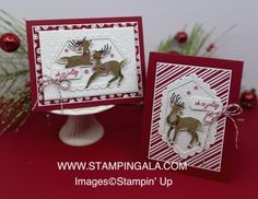 two christmas cards with reindeers on them sitting next to each other in front of a red background