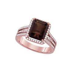 a ring with a large brown stone surrounded by white and rose gold diamond accents on the band