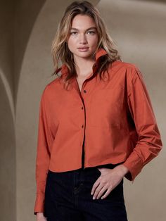 Crisp and light, our signature cotton poplin has a smooth feel against the skin, used here in an almost-cropped silhouette that’s perfect for playing with proportions.  Pair it with high-waisted jeans for casual days, or try it with a flowing midi Boxy Cropped Shirt, Rustic Orange, Cropped Shirt, Crop Shirt, Winter Sale, Cotton Poplin, Try It, High Waist Jeans, Baby Shop