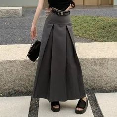 Features: Stylish and trendy long skirt, exuding a fashion-forward look 👚🌟 Made with high-quality fabric for ultimate comfort and breathability 😍🌸 Beautiful gray color, adding a touch of elegance to any outfit 🌈👌 Flattering and flowy silhouette, perfect for any body type 💃🌟 Designed with Korean fashion sensibilities, paying attention to intricate details 🎀🌼 Versatile Styling Options: Ideal for both casual outings and formal occasions 🎉🌸 Pair it with a chic blouse or crop top for a sophisticated ensemble 👚🔥 Dress it down with a casual t-shirt or sweater for a relaxed yet stylish look 👕🌟 Korean Long Skirt, Gray Long Skirt, Korean Skirts, Grey Maxi Skirt, Long Skirt And Top, Gothic Punk Fashion, Skirt Korean, Grey Maxi Skirts, Korean Tops