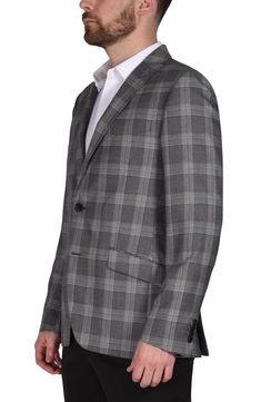 A rich glen plaid print distinguishes this woven sport coat that'll make a dapper statement to top off any look. Two-button closure Notched lapels Chest welt pocket; front flap welt pockets 70% polyester, 30% rayon Dry clean Imported Fall Plaid Business Casual Sport Coat, Semi-formal Fall Plaid Suit, Fall Semi-formal Plaid Suit, Plaid Notch Lapel Sport Coat For Business Casual, Classic Plaid Blazer For Business Casual, Plaid Suits With Suit Collar For Fall, Plaid Fall Suits With Suit Collar, Plaid Business Sport Coat For Fall, Plaid Sport Coat For Business In Fall