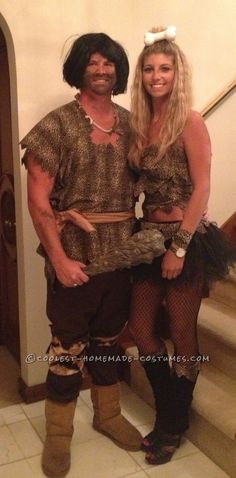 a man and woman dressed up in costumes