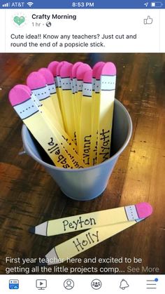 a cup full of pencils with some writing on them