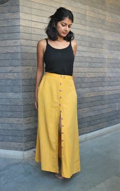 "Maxi skirt for women, Mustard linen maxi skirt, Button down skirt, Long skirt, Custom made, Made to order, Plus size -Model height: 5'3\" wearing size S -Length: 36\" -Fit: A-line -Closure: Front buttons Wear this linen skirt with a top of any size, any color, any sleeve length or no sleeves, this is an all rounder! On top of that the embroidery adds the perfect amount of bling to the linen skirt. This linen skirt shows true soul of Hastha Katha.. Comfort clothing with the touch of folk India! Hand embroidery is done on the buttons of linen skirt. French knot in red with black sequins work and white outline makes pretty flowers." Flower Skirt Outfit, Madewell Outfits, Comfort Clothing, Linen Maxi Skirt, Cotton Short Dresses, Skirt Linen, Wrap Clothing, Blue Shift Dress, Cotton Kurti Designs