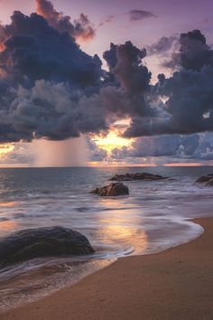 an apple logo is seen on the beach at sunset in this artistic photo taken by someone