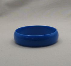 THE FIND - Here is a vintage Best Plastics lucite bangle from the 1970s. This is a cerulean blue bangle. Great bracelet and in great like new condition. True original uncirculated bangle.  Best Plastics was the premier manufacturer of lucite jewelry located in Rhode Island. This bangle measures 7 1/2 inches around the inside and is 5/8 inches wide and 2 1/2 inches across. Cerulean Blue, Lucite Jewelry, Bright Blue, Rhode Island, Bangle Bracelets, Conditioner, Bangles, Bracelet, The Originals