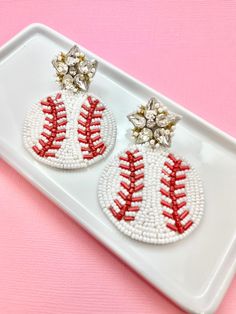 Score a home run in style with our dazzling Glitz Beaded Baseball Earrings! Perfect for baseball moms and fans alike, these earrings are the ultimate accessory for showing off your team spirit in glamorous fashion. Crafted with precision and attention to detail, each earring features intricate beading that resembles the iconic stitching of a baseball. The addition of sparkling rhinestones adds a touch of glitz and glamour, ensuring you stand out from the crowd whether you're cheering from the st Sports Earrings, Baseball Jewelry, Baseball Earrings, Mom Earrings, Earrings Summer, Fan Accessories, Summer Earrings, Baseball Gifts, Summer Earring