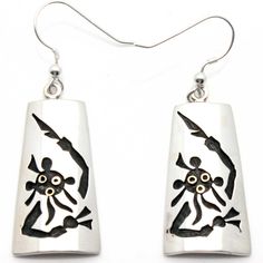 The Koyesmi symbol is featured on these beautifully detailed 1.25 Hopi Earrings. Philip Sekaquaptewa Hopi Jewelry, Symbolic Silver Drop Earrings, Silver Symbolic Engraved Earrings, Silver Symbolic Drop Earrings, Symbolic Silver Earrings With Ear Wire, Silver Engraved Symbolic Earrings, Symbolic Engraved Silver Earrings, Symbolic Silver Jewelry With Matching Earrings, Symbolic Sterling Silver Pierced Earrings