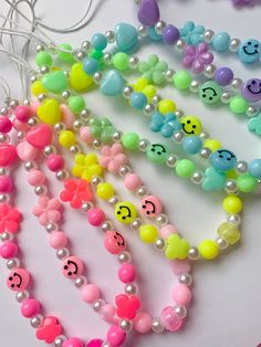 Cute Y2K Aesthetic Beaded Phone Charms ~Measures Approx 15cm ~Made using Acrylic beads and Feaux Pearls using cord string ~Available in 6 different colours If you have any questions feel free to send me a message :) 📸 Follow us on IG and tag us in your pics! @peachesandbeadsx //DISCLAIMER// Although we have designed them appropriately keep in mind our charms are decorative and are not meant to carry, hold or support the full weight of your phone 💌Shipping Info💌 ~A U S T R A L I A~ $3.50- Untracked letter post (1-2 weeks)  $5.50- For Tracked shipping (faster, safer) upgrade at checkout for only an extra $2! Note: If your order is higher than $15 please consider purchasing tracked shipping Thank you :)  //IMPORTANT DISCLAIMER// Please consider when choosing shipping methods: We always rec Y2k Adjustable Beaded Necklace, Y2k Phone, Trendy Accessories, Y2k Aesthetic, Phone Charm, Pastel Rainbow, Acrylic Beads, Different Colors, Gift Card