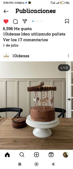 a cake sitting on top of a wooden table