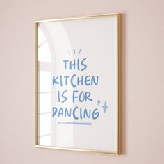 this kitchen is for dancing framed art print in gold frame on pink wall with window