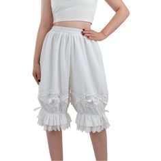 PRICES MAY VARY. 🌷Design: The white bloomers for women has elastic on the waist, cute decorative white bow tie on the front, loose fit. 🌷Style: White ruffle shorts, Victorian Bloomers, Vintage Inspired Bloomers, Renaissance Pumpkin Shorts, Womens Pantaloons Bloomers, Victorian Knickers, Pantaloons for women under dress. 🌷Material: The ruffle bloomers is made of 100% polyester. Looks comfortable and stylish. It is breathable and suit for summer. Not see-through. 🌷Occassion: The knee length pa Bloomers Vintage, White Ruffle Shorts, Victorian Bloomers, Pumpkin Shorts, Bloomers Outfit, White Bloomers, Suit For Summer, Wedding Fancy, Fancy Dress Ball