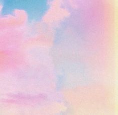 the sky is filled with clouds in pastel colors