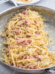 pasta with ham and cheese in a pan