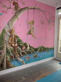 a room with a mural painted on the wall