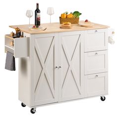 a kitchen island with two wine glasses and bottles on the top, next to a bottle of wine