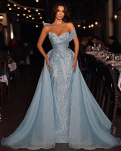 This sophisticated prom dress features an A-line silhouette and an off-the-shoulder neckline decorated with elegant sequins. The detachable train gives the dress an extra touch of elegance, perfect for any formal occasion. Foreign Wedding, Sangeet Lehenga, Dress With Detachable Train, Jeweled Dress, Strapless Prom Dress, Detachable Train, Banquet Dresses, Beirut Lebanon, Sequin Prom Dress