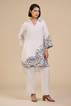 White linen high low tunic with placement rose garden embroidery. Paired with a pant with curved hem. - Aza Fashions Elegant Tunic Sets For Spring, Elegant Spring Tunic Sets, Elegant Linen Kurta For Spring, Elegant Summer Sets With Embroidered Hem, Tunic With Pants, Embroidery Rose, Placement Embroidery, Garden Embroidery, Pant For Women