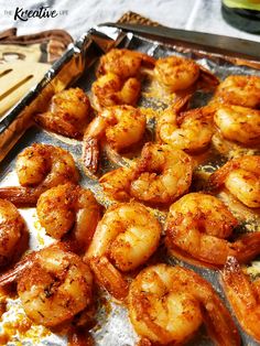 cooked shrimp on a baking sheet ready to be served