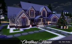 a large christmas house with lights on it's windows and trees in the yard