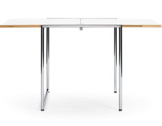 a white table with two metal legs and a wooden top on an isolated white background