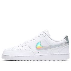 The Nike Court Vision Low 'White' is a modern take on a classic basketball style. Inspired by the mid-1980s trend, this hybrid sneaker is crafted with a combination of leather, synthetic leather and rubber. The sleek silhouette is perfect for a range of activities, while the multi-color accents and black details add a touch of retro flair. The plastic sole provides lightweight cushioning and stability, ensuring comfort and durability. Whether you're on the court or the street, the Nike Court Vis 1980s Trends, Nike Court Vision Low, Basketball Style, Nike Court Vision, Court Vision, Marina Blue, Womens Nike, Nike Womens, Round Toe Heels