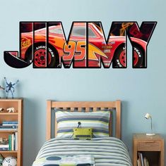 a child's bedroom with the name jimmy painted on the wall