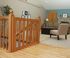 a living room filled with furniture and a fire place next to a wooden flooring