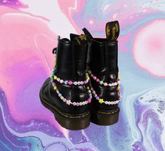 ✨ Custom beaded boot charm bracelets for your Dr. Martens or any kind of lace-up boot! ✨ In the personalization box, please specify four different words or numbers & the placement of each. We will create a unique pair of rainbow charm bracelets that are customized to you! (We recommend choosing words or numbers 10 characters or less, so each strand is similar in length.)  ✨Your bracelets will come in a randomized rainbow beaded pattern, as well as the color of the letters/numbers. Don't worry th Doc Marten Charms, Thrift Flip Ideas, Platform Doc Martens, Purple Scrunchie, Rave Shoes, Punk Fashion Diy, Festival Outfits Rave, Y2k Shoes, Boot Bracelet