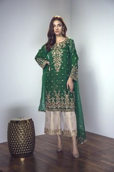 Intricate zardozi embroidery in gold on chiffon shirt. Pants will be gold jamawar fabric with golden gotta lace on hem. It comes with chiffon dupatta with gotta lace and chan motifs. Brocade pants print design may vary silghty Color of this outfit can be changed. Custom sizing is free of cost. Please inbox me if you like to get a measurement form. Embroidery and stitching will take 6-7 weeks. Shipping will take 3-5 days  If you need it urgently message me. Jamavar Pants, Pakistani Party Wear Dresses, Eastern Wear, Mehndi Dress, Mehndi Dresses, Shadi Dresses, Pakistani Formal Dresses, Dresses Pakistani, Desi Wedding Dresses