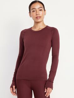 crew neck raglan sleeves thumbhole cuffs go-dry wicks moisture fitted hits high on hip models are approx.  5'9" and wear sizes s (4), l (12), and xl (18)machine wash according to the care instruction label  . Best Holiday gift for Women , perfect Tops for Christmas! Seamless Top, Old Navy Women, Petite Size, Active Wear Tops, Wicks, Raglan Sleeve, Toddler Boys, Old Navy, Active Wear