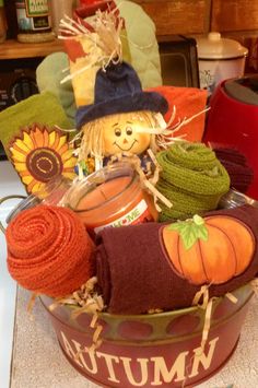 a basket filled with knitted items on top of a counter