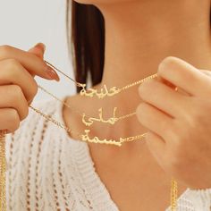 Get your unique and eye-catching✨ Personalized Arabic Name Necklace now. Available in multi different styles of chains. Wear a name necklace is a great way to add a burst of uniqueness and personality. With the Personalized Name Necklace beautifully packaged in a gift box, 🎁 it also makes it a thoughtful and memorable gift for loved ones on special occasions such as Valentine's day, Christmas, Mother's Day, or Thanksgiving.  💍Our Custom Name Necklaces are made of the highest quality brass or s Engraved Nameplate Chain Necklace As Gift, Engraved Nameplate Chain Necklace Gift, Customizable Silver Chain Necklace For Gift, Customized Name Necklace Pendant, Engraved Pendant Chain Necklace As Gift, Engraved Pendant Chain Necklace Gift, Engraved Pendant Chain Necklace For Gift, Unique Personalized Gold Necklaces, Unique Personalized Necklace For Her