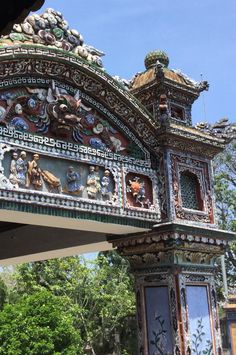 an ornate building with many paintings on it