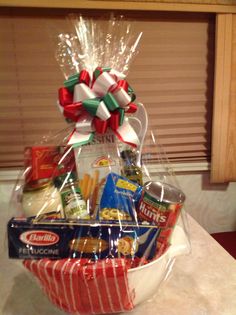 a basket filled with snacks and candy on top of a counter