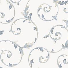 a white wallpaper with silver swirls on it